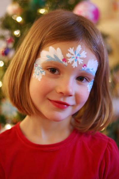 9. Zuckerstangen-Wangenmotiv for face painting ideas for kids christmas ideas