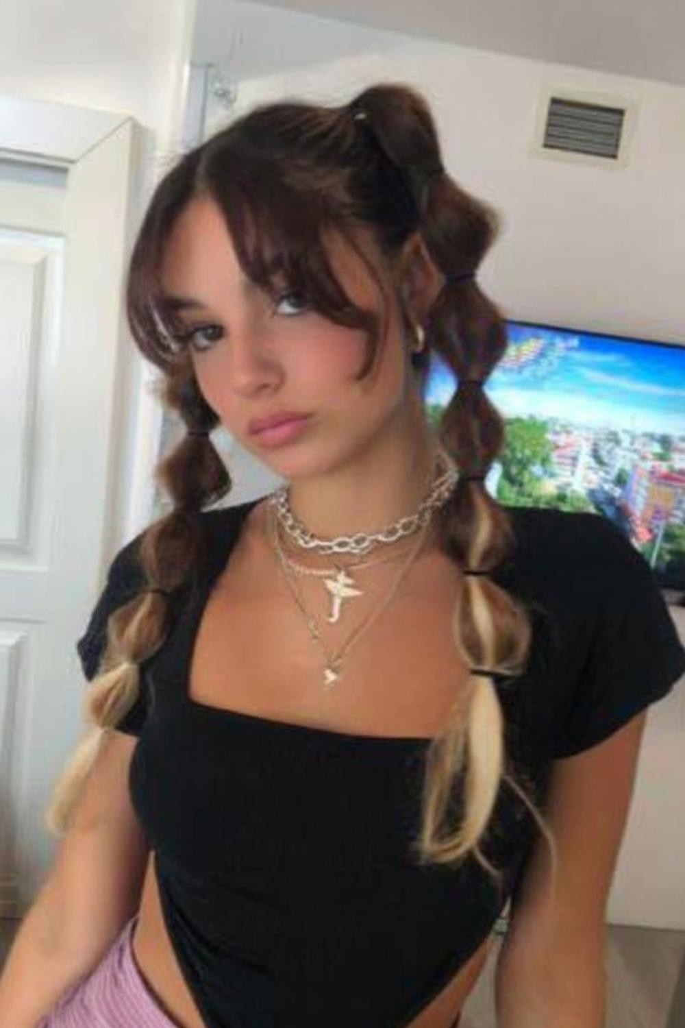 Sleek Pigtails mit Attitude