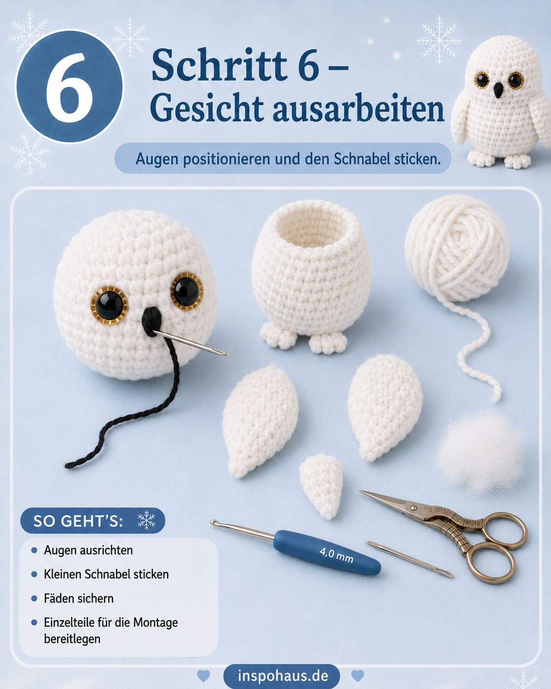 Gesicht der Amigurumi-Schneeeule mit positionierten Augen und gestickter schwarzer Nase